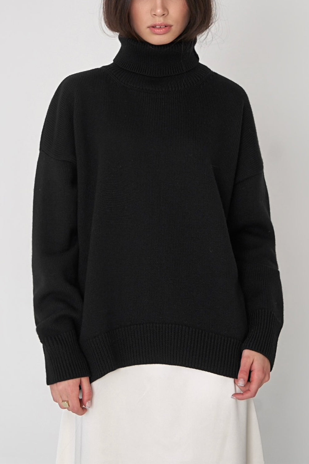 Pull femme col roulé oversize à ourlet asymétrique