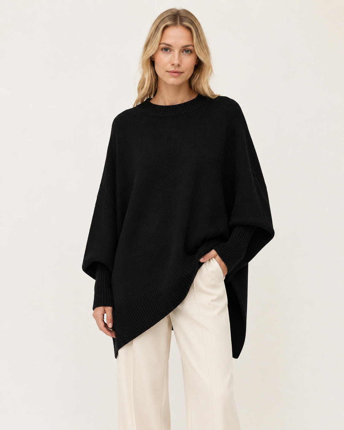 Pull femme oversize rose poudré à ourlet asymétrique