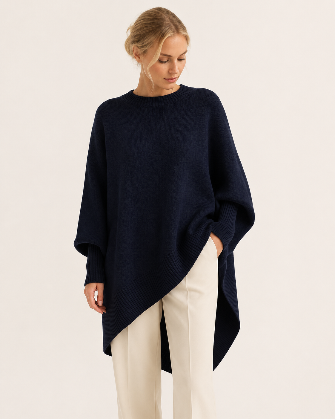 Pull femme oversize rose poudré à ourlet asymétrique