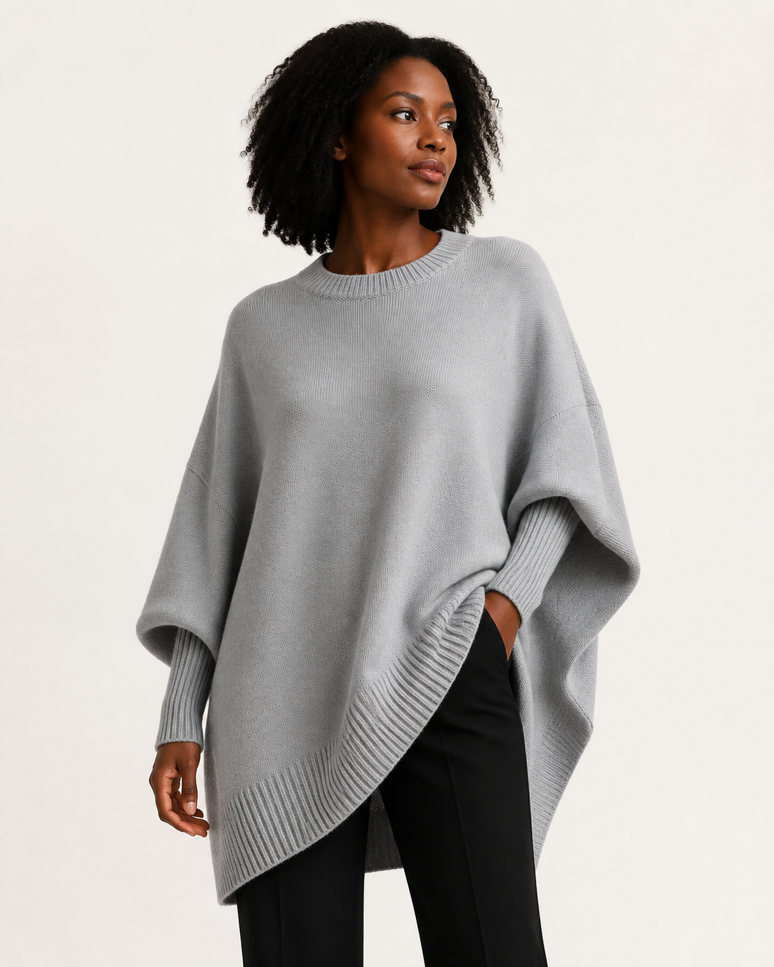 Pull femme oversize rose poudré à ourlet asymétrique