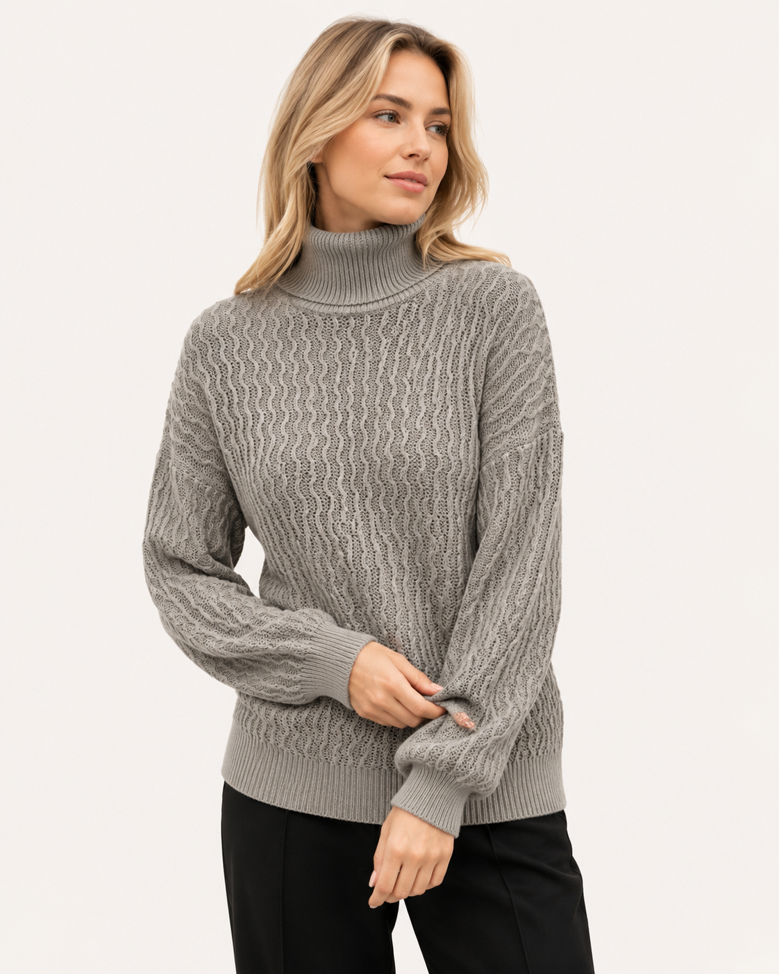 Pull femme col roulé en maille torsadée
