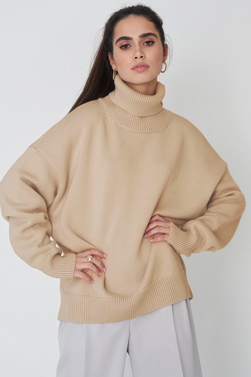 Pull femme col roulé oversize à ourlet asymétrique